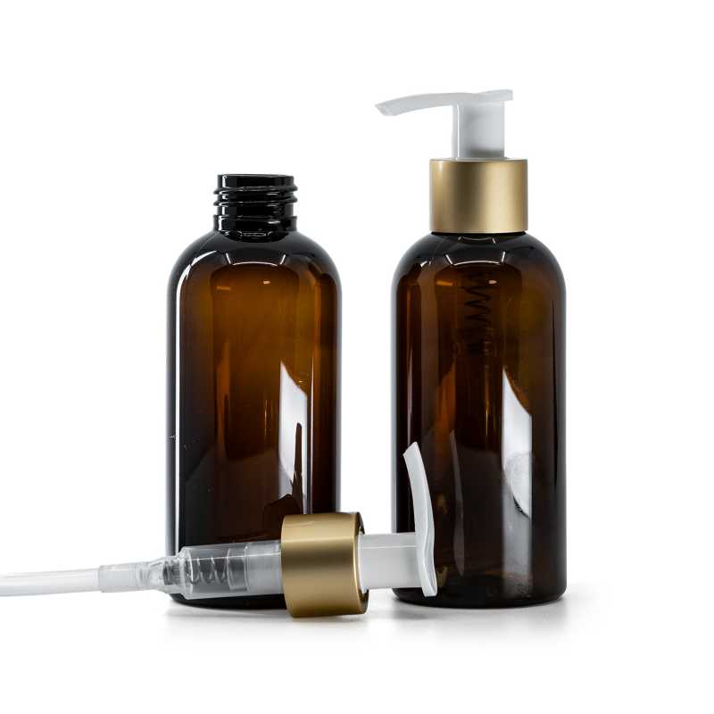 Hnědá plastová láhev s bílým dávkovačem a matně zlatým kroužkem 150 ml