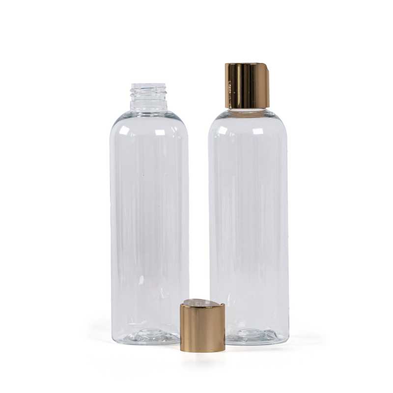 Plastová láhev průhledná, zlatý disc top, 250 ml