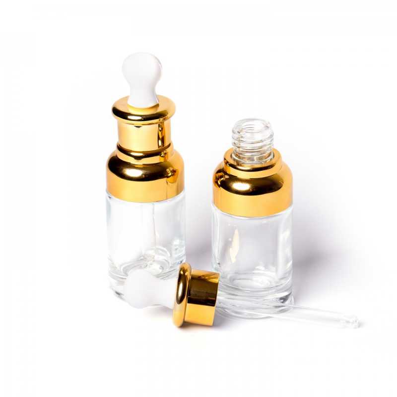 Luxusní skleněná láhev z tlustého skla s víkem zlaté barvy a kapátkem, vhodná na oleje, esenciální oleje a tekutá séra. Objem: 20 ml Výška: 10 cm