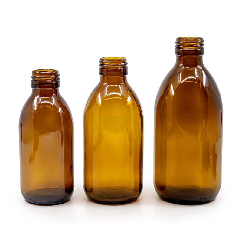 Skleněná lahvička, nazývaná vialka, o objemu 100 ml je vyrobena ze silného skla tmavě hnědé barvy. Používá se k uchovávání tekutin, které díky 