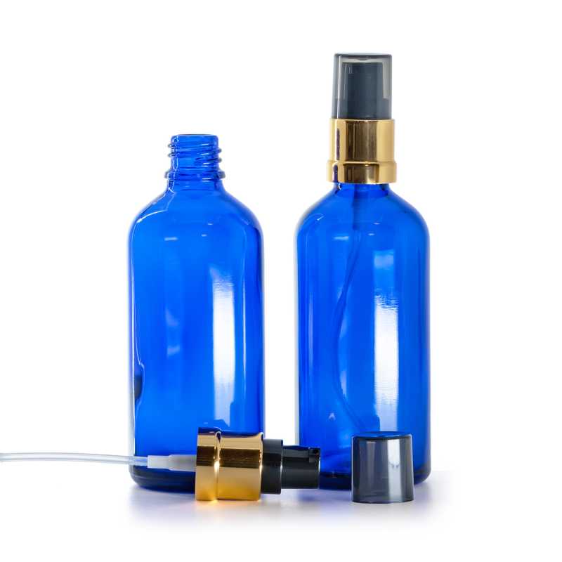 Skleněná lahvička, modrá, černo-zlatý lesklý dávkovač s dýmovým krytem, 100 ml