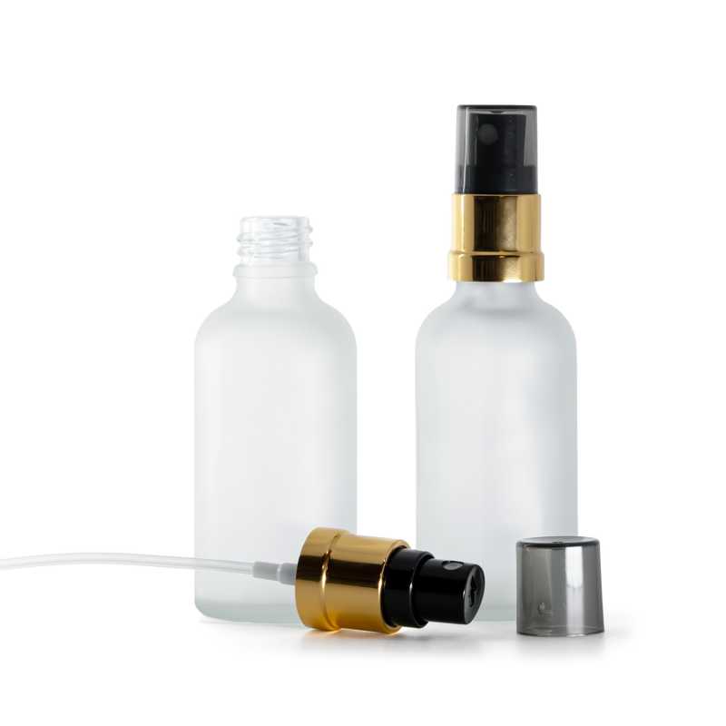 Skleněná lahvička, průhledná mléčná, černo‑zlatý rozprašovač, dýmový kryt, 50 ml
