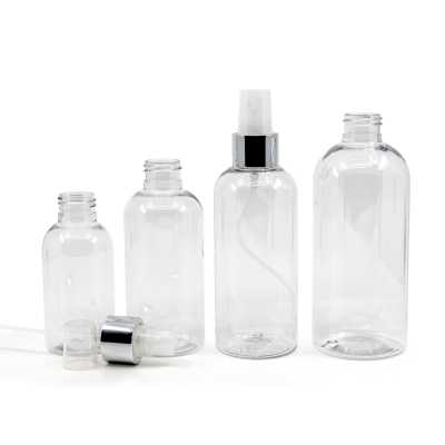 Plastová láhev průhledná, zaoblená, průhledný sprej, stříbrná lesklá obruč, 100 ml